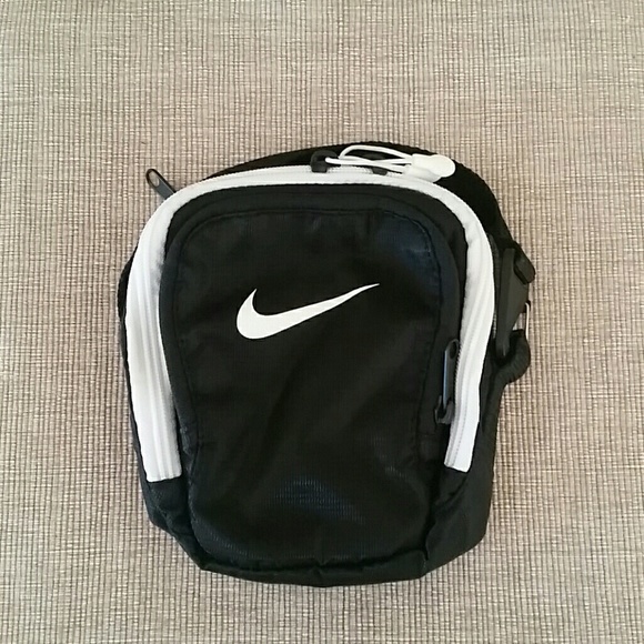 Nike Handbags - Nike black mini bag pouch travel case hook strap